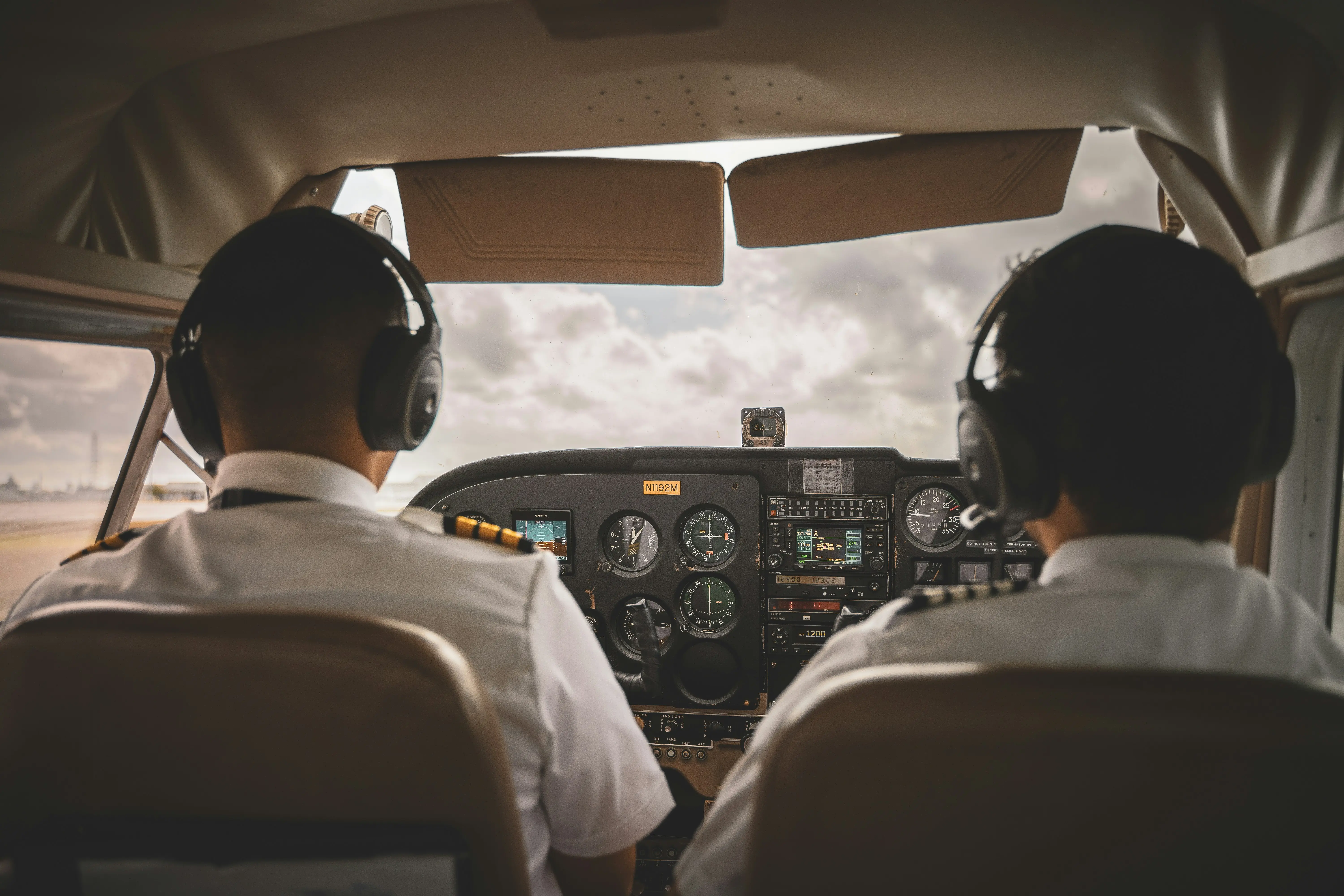 Pilots in cockpit by Pasqualino Capobianco