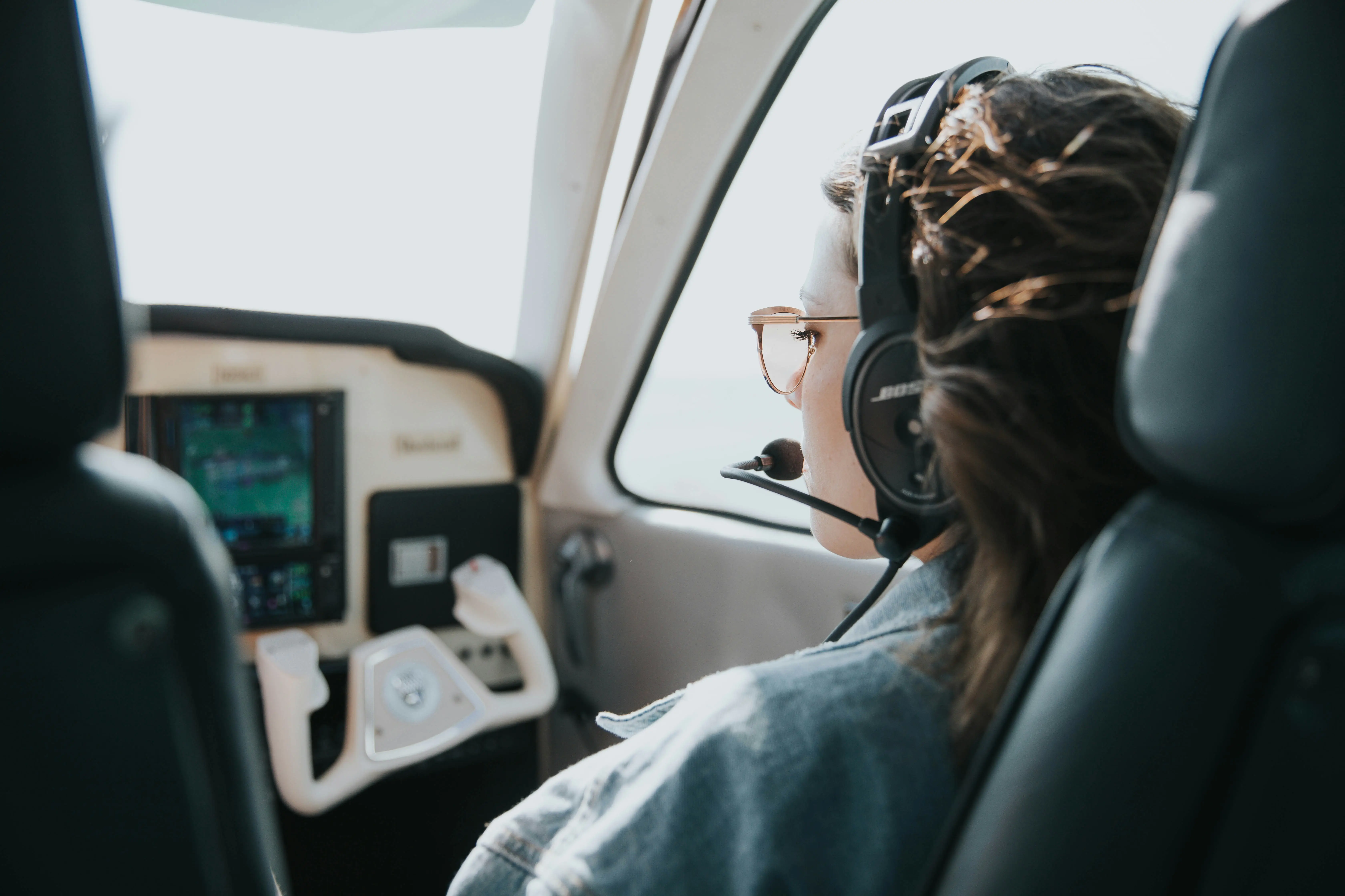 Student pilot in cockpit by Truman Talbot